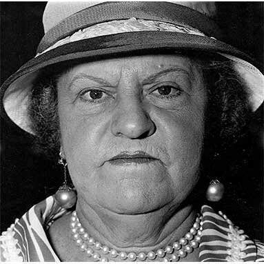 Diane Arbus: A woman with pearl necklace and earrings, N.Y.C. 1967