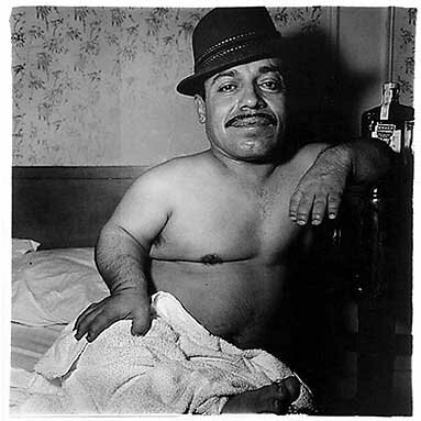 Diane Arbus: Mexican dwarf in his hotel room in N.Y.C. 1970