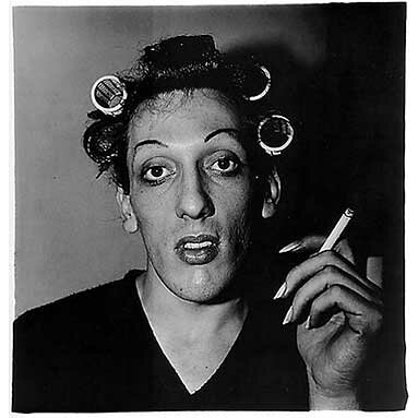 Diane Arbus: A young man with curlers at home on West 20th Street, N.Y.C. 1966