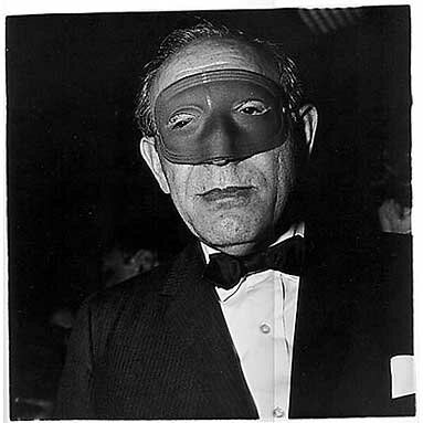 Diane Arbus: Masked man at a ball, N.Y.C. 1971